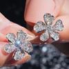 Cao Shi Japón y Corea del Sur Pendientes de Flores Pequeñas Frescas Pendientes de Flor de Circonita Brillante Pendientes de Flor Recomendados por Little Red Book Mujer