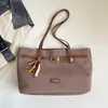 Bolsa Grande Capacidade Transfronteiriça Feminina Outono 2026 Nova Versátil Moda Ombro Único Tendência Trabalho Retro Casual Bolsa Tote