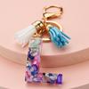 Llavero con 26 letras en inglés, estilo europeo y americano, con borlas de cristal acrílico transparente, adorno para bolso, pequeño regalo.