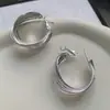 Pendientes Distintivos Estilo Europeo y Americano Chapado en Oro de 18k Arco Pendientes de Alta Calidad Lujo Ligero Moda Francesa Retro Pendientes de Botón Dorados