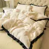 Juego de ropa de cama de cuatro piezas estilo princesa con encaje, funda de edredón y sábana de gasa arrugada de doble capa tipo nube, juego de tres piezas para dormitorio de estudiante