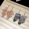 Aretes de aguja plateada con colgantes de borlas de diamante, circonita y cristal, aretes estilo resort de playa, aretes de lujo ligero de alta gama al por mayor