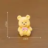 Micro Paisaje Lindo Lazo Oso de Peluche Muñeca Partículas Lindas Casa de Muñecas DIY Accesorios Decorativos Pequeños Adornos de Escritorio