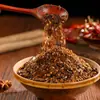 Especialidad de Guizhou: semillas de jengibre, chile tostado, salsa para mojar de chile marino, fideos de chile auténticos asados al fuego, salsa para fondue, aceite de chile