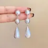 Brincos Pendentes de Ouro Fosco Escovado em Forma de Gota de Água Estilo Francês Vintage, Design de Nicho, Brincos da Moda com um Toque de Luxo Leve, Brincos Longos