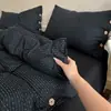 Popular conjunto de cuatro piezas de gasa fruncida de algodón lavado a rayas, conjunto de tres piezas para dormitorio estudiantil, sábana, sábana ajustable, suave y acogedor, diseño simple estilo japonés