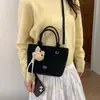 Bolsa Balde de Mão Nova Estilo Primavera 2026 Transfronteiriça para Mulheres, Bolsa de Ombro Casual da Moda Tendência com Toque de Luxo, Bolsa Transversal