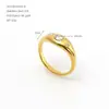Anillo de diamante de acero inoxidable europeo y americano transfronterizo para mujer, moderno y sencillo, oro vintage de 14k con múltiples piedras de zirconia redondas