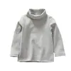 Versão coreana de camisa base de algodão escovado de gola alta para crianças meninos e meninas casaco base de algodão não desbota e não faz bolinhas
