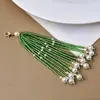 Popular Borla de Cuentas de Arroz de Lirio del Valle Estilo Antiguo Broche Colgante Hanfu Perla Cuentas de Arroz Tejido a Mano Accesorios de Joyería