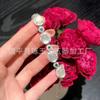 Venta al por mayor de fábrica 925 chapado en plata incrustado calcedonia blanca hielo alto traje ágata pendientes pulsera collar anillo cuatro piezas
