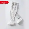 Calças infantis, calças esportivas casuais grossas forradas de lã para meninos e meninas, calças de moletom quentes e à prova de vento, calças amarradas no tornozelo à prova de vento