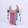 Venta al por mayor de fábrica auriculares con forma de vaca nueva moda Animales de peluche creativos de dibujos animados Auriculares para teléfono móvil de celebridad de Internet