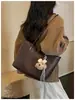 Bolso bandolera tejido para mujer de nueva importación, gran capacidad, color liso, versátil y elegante bolso de hombro tipo tote para el trabajo