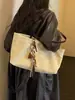Bolso de hombro casual simple al por mayor para mujer, nuevo bolso de lona simple de moda para el día a día, bolso de gran capacidad para debajo del brazo