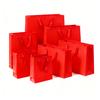 Bolsa de Papel Kraft con Asa Bolsa de Regalo Bolsa para Empaque de Ropa Publicidad Ropa para Mujer Joyería Bolso de Mano Logotipo Impreso Personalización