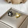 Brincos de clip para orelha com camélia em esmalte gota retrô francês sem furo na orelha, femininos, clássicos, preto e branco, de alto padrão, pérola, atacado