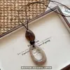 Estética China ~ Collar Largo Retro Difuminado para Mujer 2025 Nueva Cadena de Suéter de Alta Gama Accesorios de Diseño de Nicho