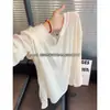 Top fino estilo coreano com vazados e manga longa para homens e mulheres, casual de outono, respirável, solto, estiloso, versátil e moderno