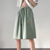 Pantalones cortos de seda helada estilo Hong Kong para hombre, verano, ajustados, de moda, versión coreana, corte holgado, adecuados para correr, casuales y versátiles