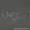 Gafas de titanio puro, modernas y sencillas, sin montura, ultraligeras 5573GR, estilo de diseñador, al por mayor de gafas graduadas hechas a mano en Shenzhen
