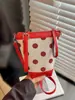Bolso cubo de moda de lunares transfronterizo, bolso de hombro versátil y elegante estilo coreano para el uso diario y el trabajo, bolso cruzado de color block de nicho