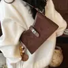Bolsa de camurça vintage 2026 feminina luxo leve ombro axila transversal outono bolsa de mão nova moda coreana requintada
