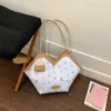 Bolso de hombro tote casual de gran capacidad, moda nueva primavera 2026, lindo, estampado, simple, versátil, elegante