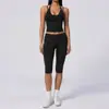 Camisola de yoga estilo europeo y americano con cuello halter de tacto desnudo, tipo dos piezas falsas, adelgazante y levantadora de glúteos, adecuada para deportes casuales y fitness