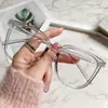 Óculos bloqueadores de luz azul para mulheres, estilo coreano, visual natural, armações de óculos irregulares da moda, óculos de grau prontos para homens, armações de aro plano retrô