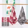 Hilo de color pretratado oscuro rejilla circular jacquard de 32 cabos toalla de regalo suministros de protección laboral al por mayor grueso 120 gramos