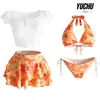 Novo maiô de duas peças 2026 com gola halter e mangas curtas para mulheres, apresentando uma saia de bolo degradê, perfeita para um look doce e casual de praia, spa ou férias