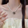 Collar retro francés estilo Chanel de camelia negra con gota de aceite y perlas para mujer, combinable con todo, sentido de alta calidad, nicho, accesorios de lujo ligero