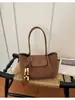 Bolso tote de tejido de estilo coreano, súper moderno, con bloques de color, para mujer, colección 2026, elegante, de gran capacidad, versátil y adecuado para el trabajo.