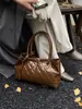 Bolso Transfronterizo para Mujer 2025 Nuevo Popular Estilo Coreano Moderno Sencillo Acolchado Gran Capacidad Portátil Bolso de Hombro Tote para Mujer