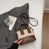 Bolsa bucket personalizada casual de nicho, bolsa da moda estilo retrô novo, nova bolsa de ombro e transversal feminina 2026