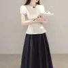 Top coreano de manga corta con cuello de muñeca para mujer, moda de verano 2026, nueva camisa de estilo francés, conjunto de alta gama y adelgazante