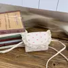 Bolso Infantil Estilo Coreano con Borde de Encaje Nuevo Verano 2025 Moda Versátil Mini Lazo Simple Bolso de Hombro Cruzado