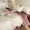 Juego de ropa de cama de lujo de cuatro piezas de algodón de fibra larga de 80 hilos, sábana bajera 100% algodón, funda de edredón bordada, juego de tres piezas de alta gama