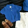 Estilo coreano para meninos, infantil, verão 2026, novo, vazado, Polo azul, malha de manga curta, casual, shorts brancos