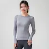 Camada Base Esportiva de Tricô Seamless Peça Única Manga Longa Gola Redonda Slim Fit Abertura para Polegar Elástica Respirável para Fitness Yoga Treinamento