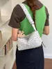 Bolsa de lona floral casual estilo coreano para mujer, nueva bolsa versátil 2026 para el hombro y cruzada para ir al trabajo, bolsa de mano de gran capacidad