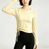 Top de yoga para mujer con cuello redondo, cordón y mangas largas. Alta elasticidad, transpirable y adelgazante, perfecto para correr, fitness y como capa base para entrenamientos.