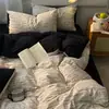 Atacado transfronteiriço de novos conjuntos de lençóis com estampas minimalistas de tema escuro em fio puffy (quarteto)