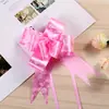 49 flores de tirón suministros para celebración de bodas cinta de lazo caja de regalo de boda empaque decoración de coche de boda tirador de manija de puerta flores de tirón al por mayor