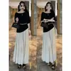 Conjunto de verano de moda hecho a medida: conjunto de top asimétrico de hombros descubiertos y falda de estilo francés nuevo y moderno