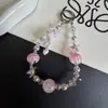Nueva correa de cristal para teléfono con cuentas de estrella de mar, llavero con colgante de concha, decoración para bolso, funda de auriculares para mujer, venta al por mayor