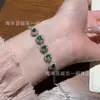 Venta al por mayor del fabricante: Pulsera de Jade Verde Natural Xiaohongshu con Incrustaciones de Plata S925, Forma Cuadrada, Fresca y Delicada para Mujeres