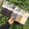 26 Calcetines Caídos de Media Pantorrilla para Mujer Otoño Invierno Calcetines de Pelo de Camello Calidez para Mujer Otoño Invierno Venta al por Mayor