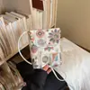 Bolsa de Tela Bordada de Alta Gama Transfronteriza para Mujer 2026 Nuevo Estilo de Nicho Versátil de Moda Bolso Cruzado Bolso para Teléfono